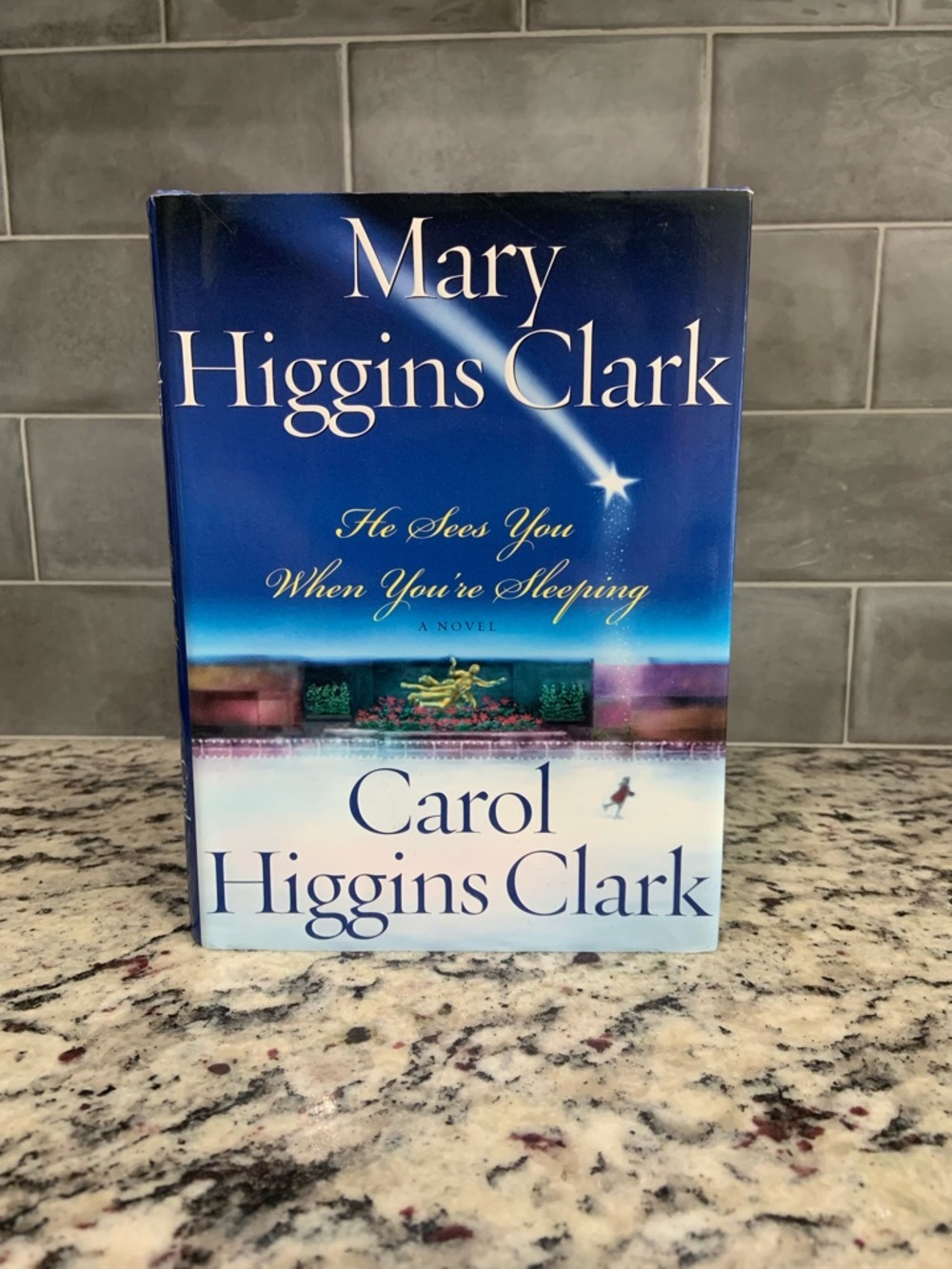 Carol Higgins Clark “He sees you when you’re sleeping” Hardcover Book- GUC